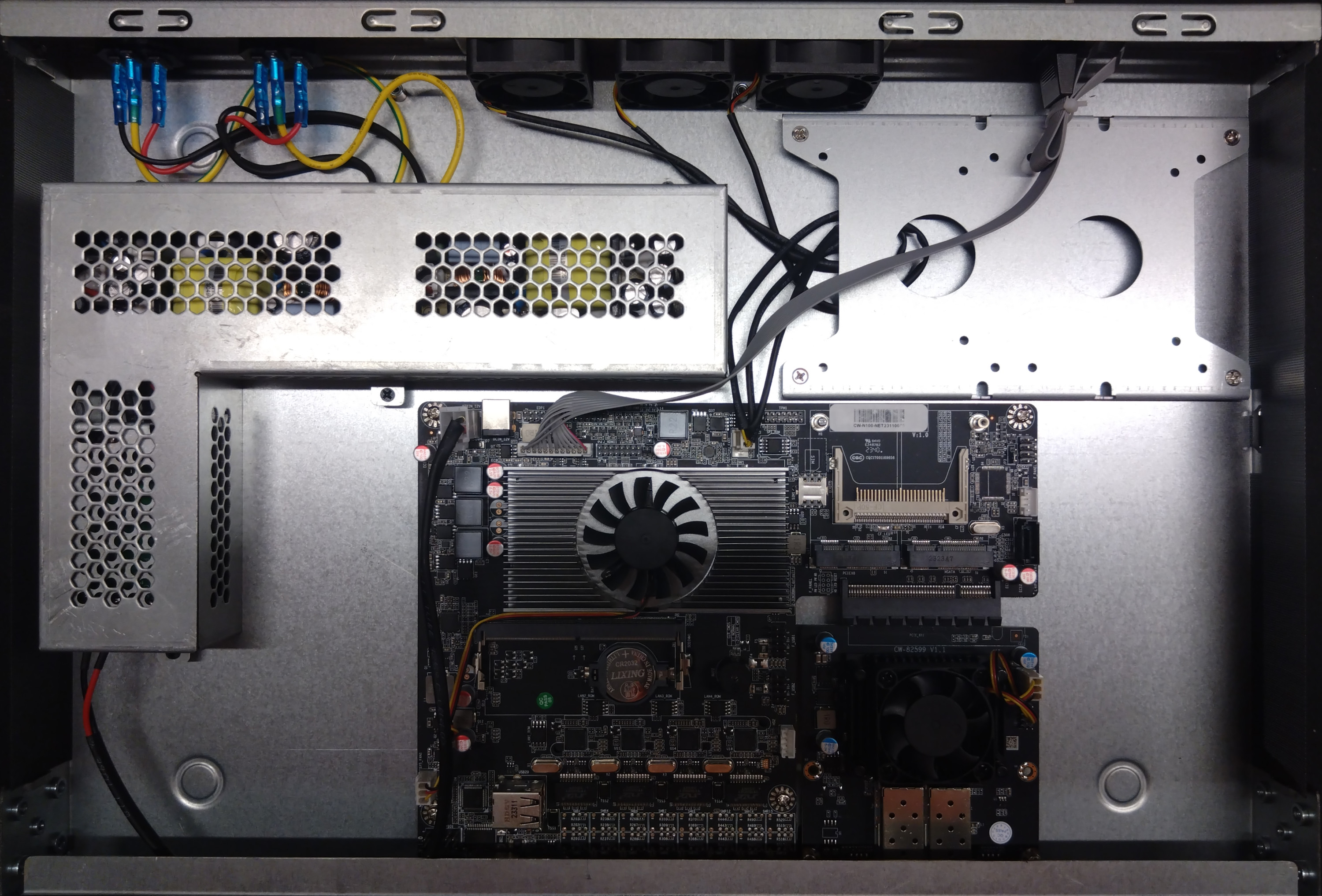 The internals of this server, with the PSU cover intact
